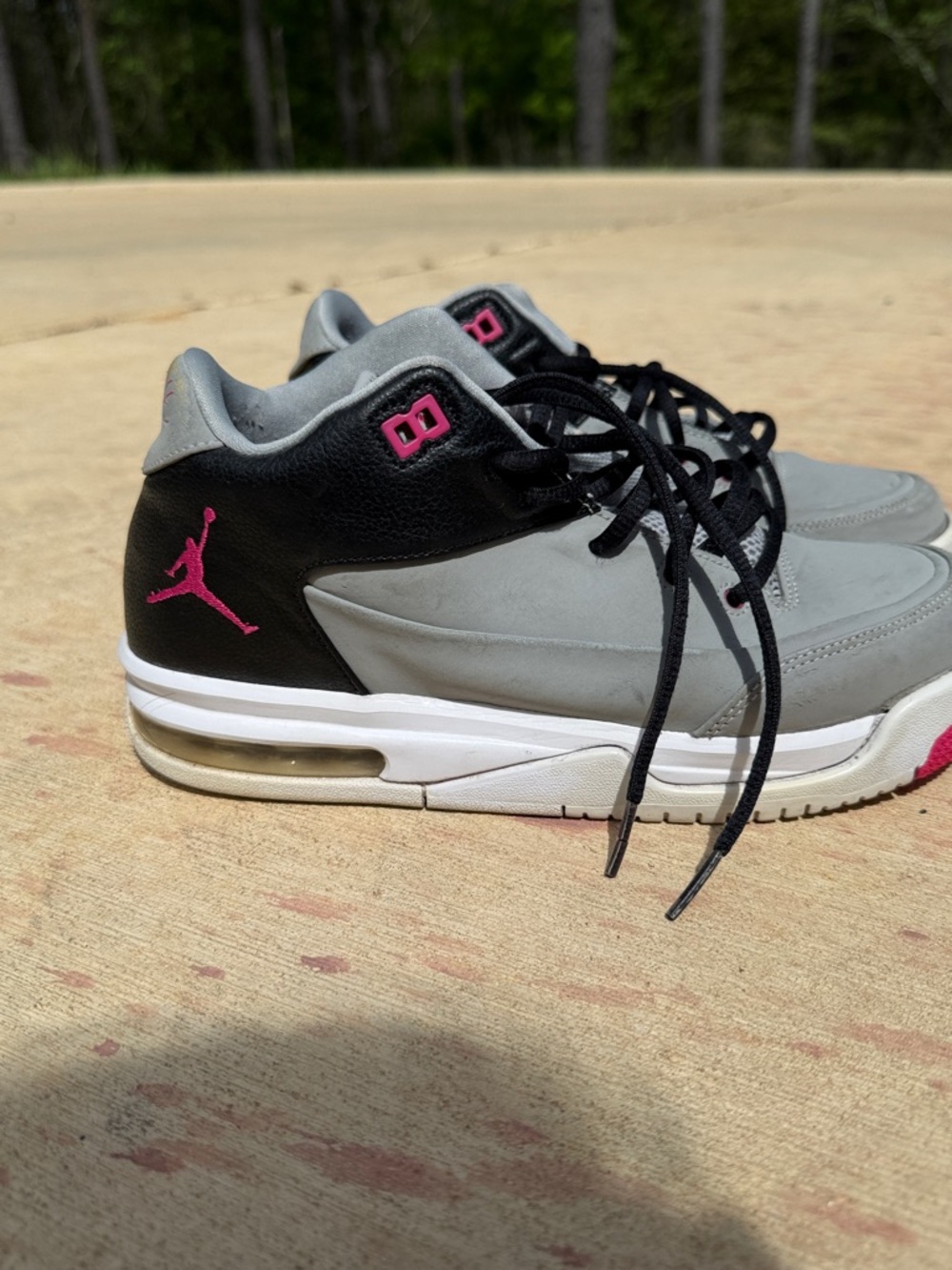 Jordan Grey and Black Low-Top Sneakers with Pink Accents